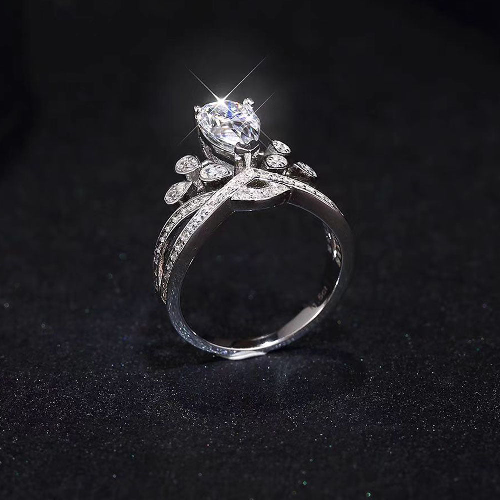 Crowned Feather Pear Moissanite Crown Wedding Ring